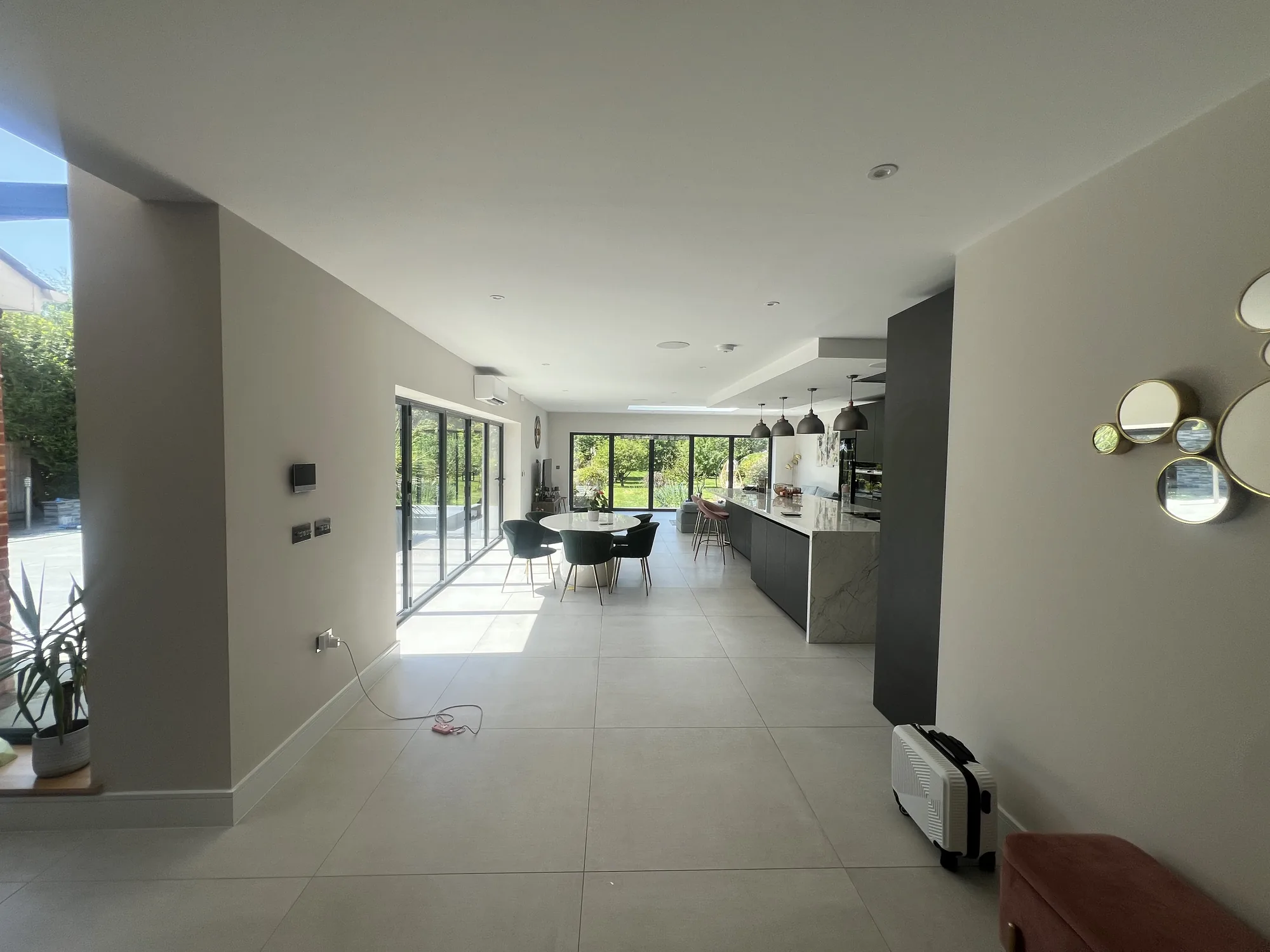 Pipework run cleanly between the outdoor and indoor units on a multi-split install